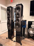 Dynaudio Confidence 60 Floorstanding Speaker Midnight High Gloss Customer Trade-in (Pair) displayed in a modern audio showroom.
