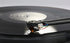 Rega ND9 Moving Magnet Phono Cartridge capturing sound from a vinyl record on a turntable.