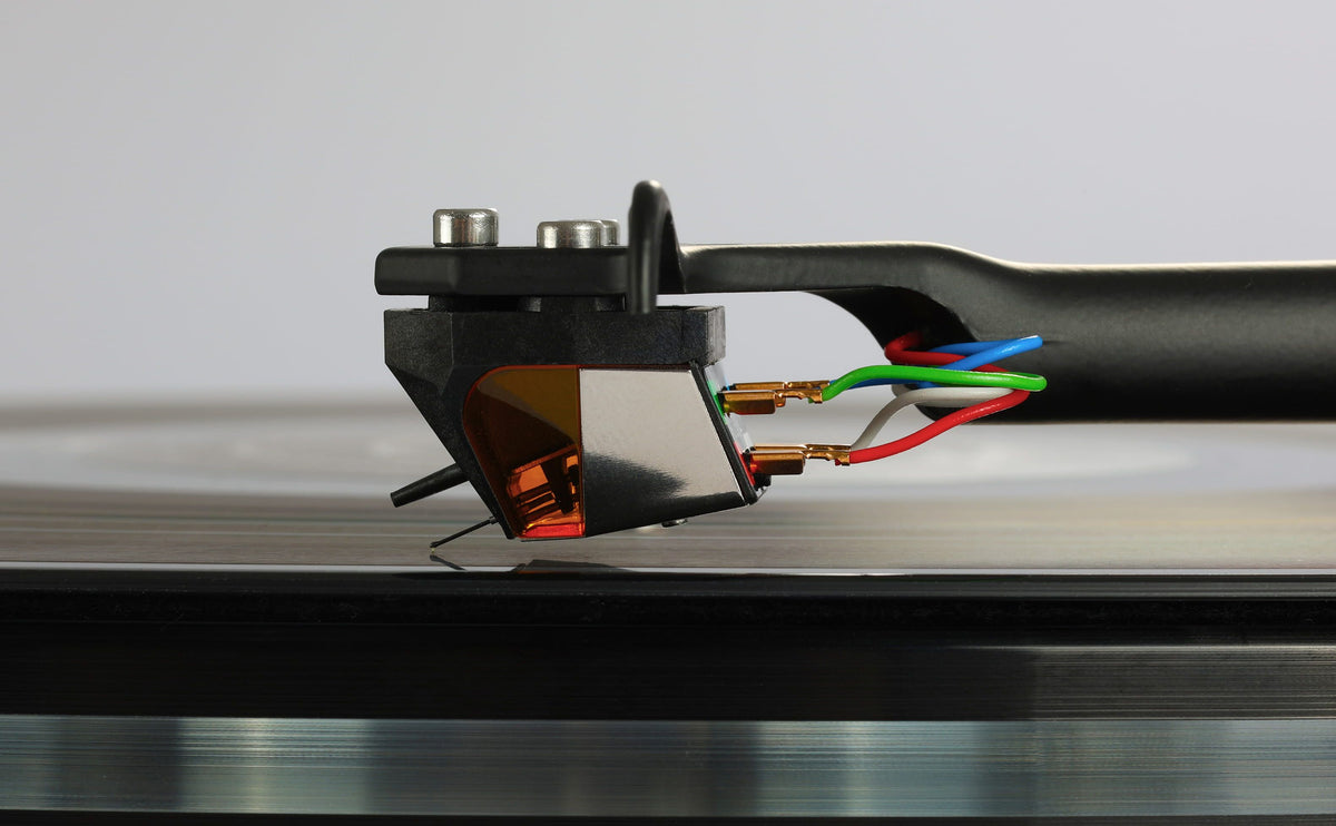 Rega ND9 Moving Magnet Phono Cartridge installed on a turntable, showcasing its innovative cantilever design.