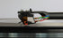Rega ND9 Moving Magnet Phono Cartridge installed on a turntable, showcasing its innovative cantilever design.