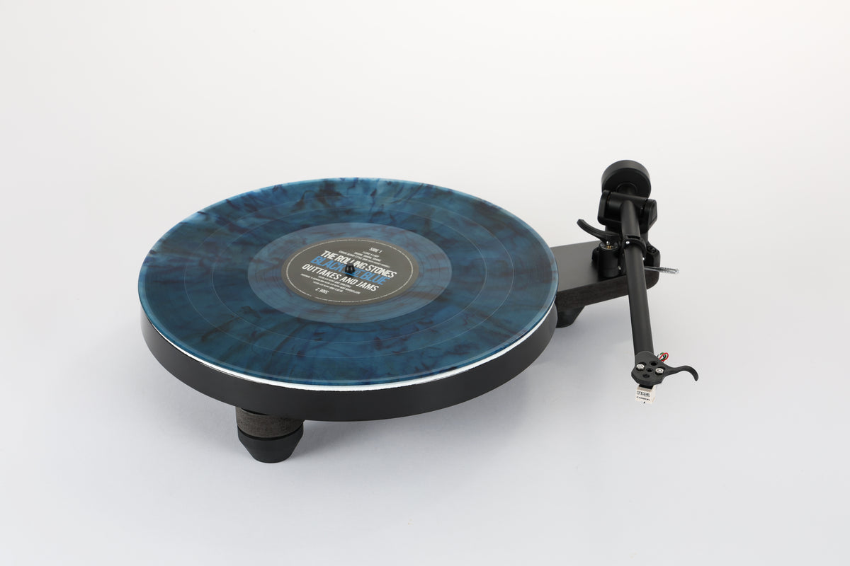 Rega Replay Plug and Play Turntable with Rega Carbon Cartridge showcasing its unique multi-colored vinyl.