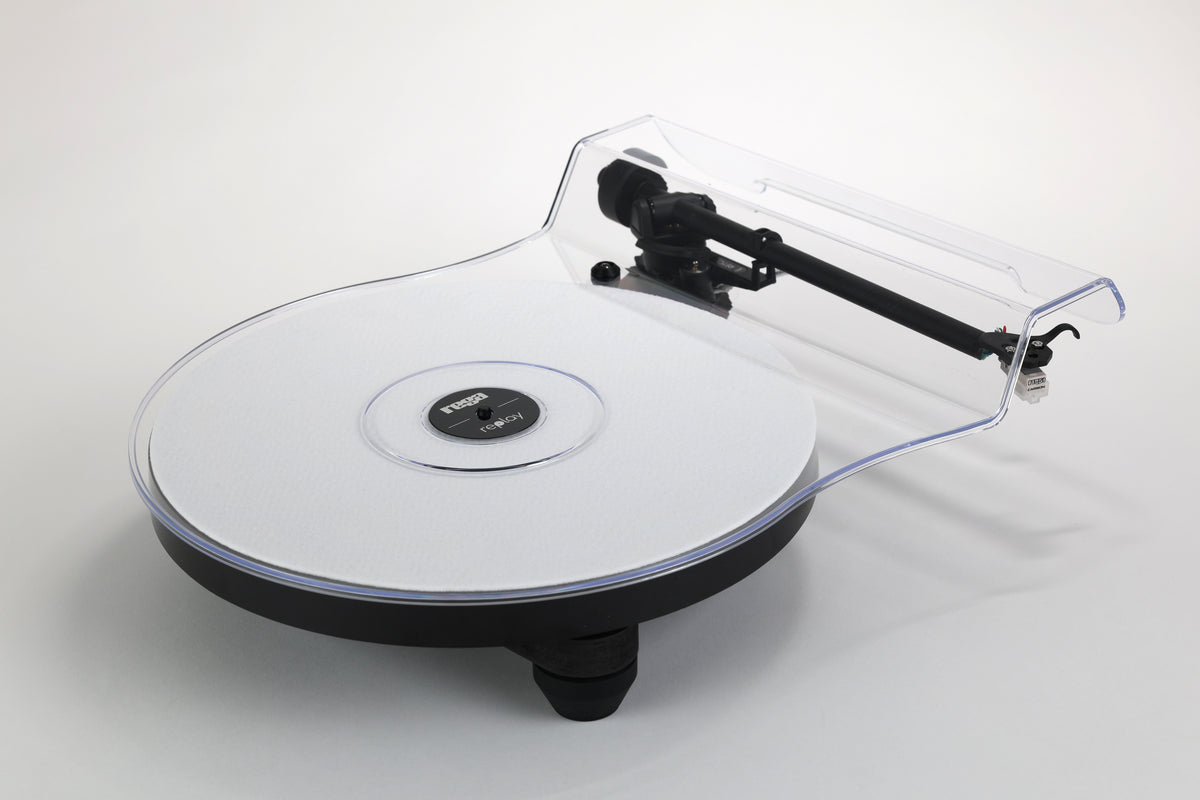 Rega Replay Plug and Play Turntable with Rega Carbon Cartridge showcasing its sleek design and performance features.