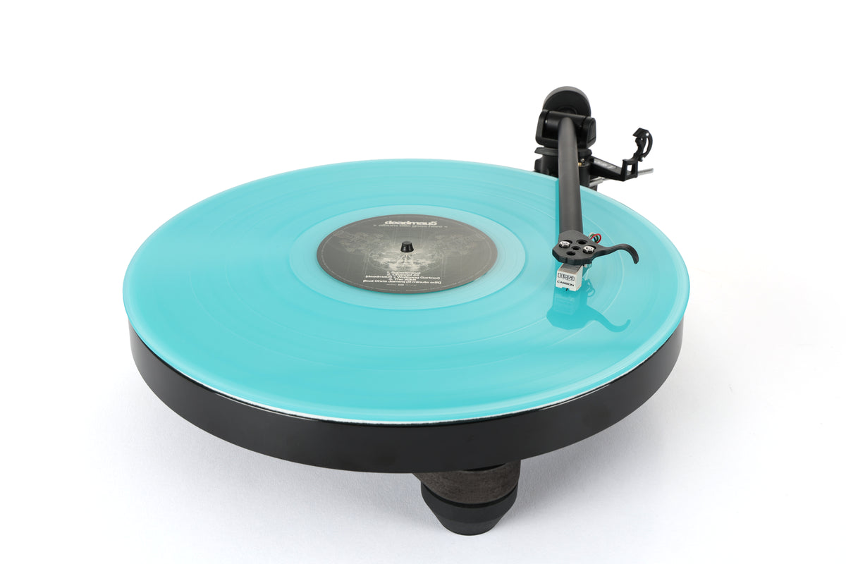 Rega Replay Plug and Play Turntable with Rega Carbon Cartridge featuring turquoise vinyl record.